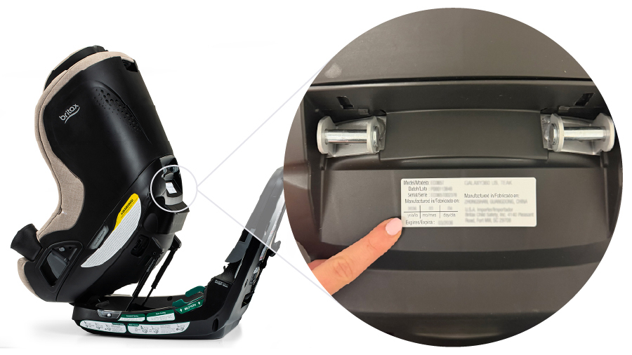 Person pointing to the underside of a car seat.