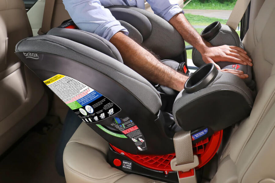 Parent Installing a One4Life Car Seat Rear-Facing