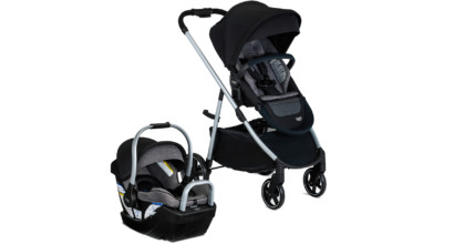 Right side view of a grey and black infant car seat in a base next to a grey and black baby stroller.