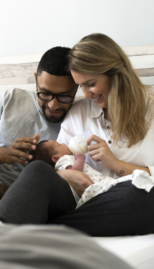 Mom and Dad with new born baby