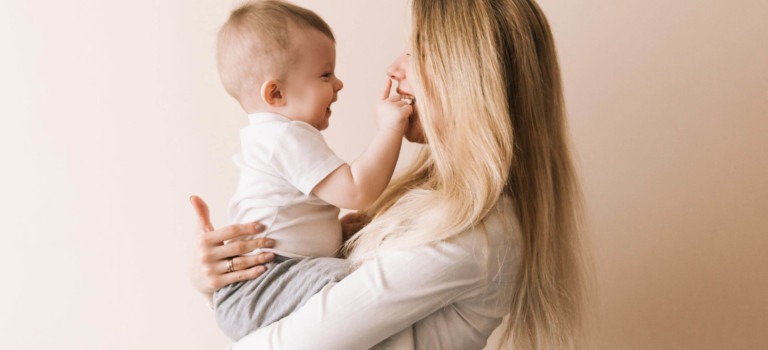 Mother holding baby in her arms