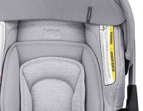 Britax infant car seat with retracted canopy, grey car seat cover, and car seat inserts.