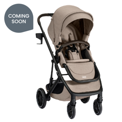 Coming soon. A tan stroller with a canopy, a brown bumper bar, a cup holder, and the Britax logo on the leg rest.