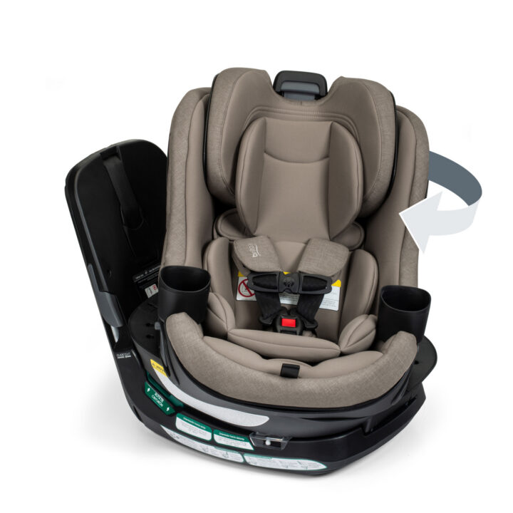 A greige rotating convertible car seat with the Britax logo on the harness pad.